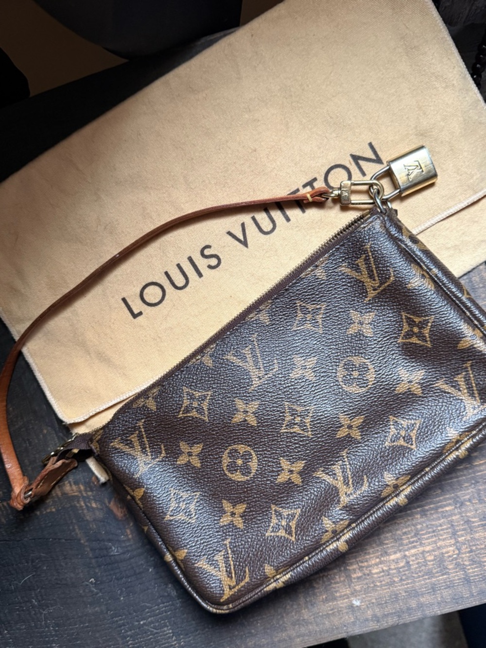 Louis Vuitton Monogram Canvas “Mini Pochette” vintage in Brown and Gold